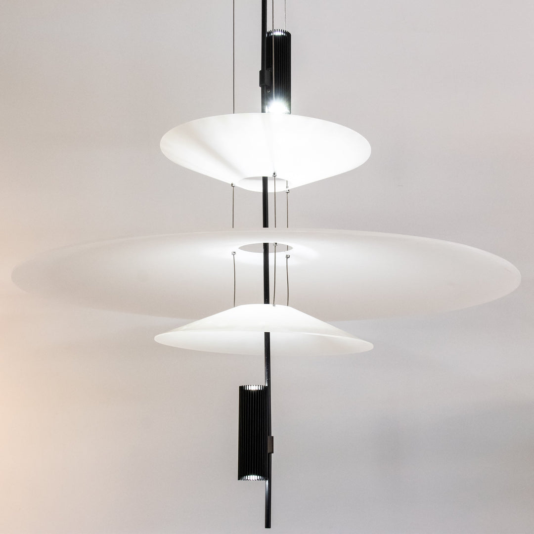 Sleek Merru black LED pendant light, a modern architectural statement piece.
