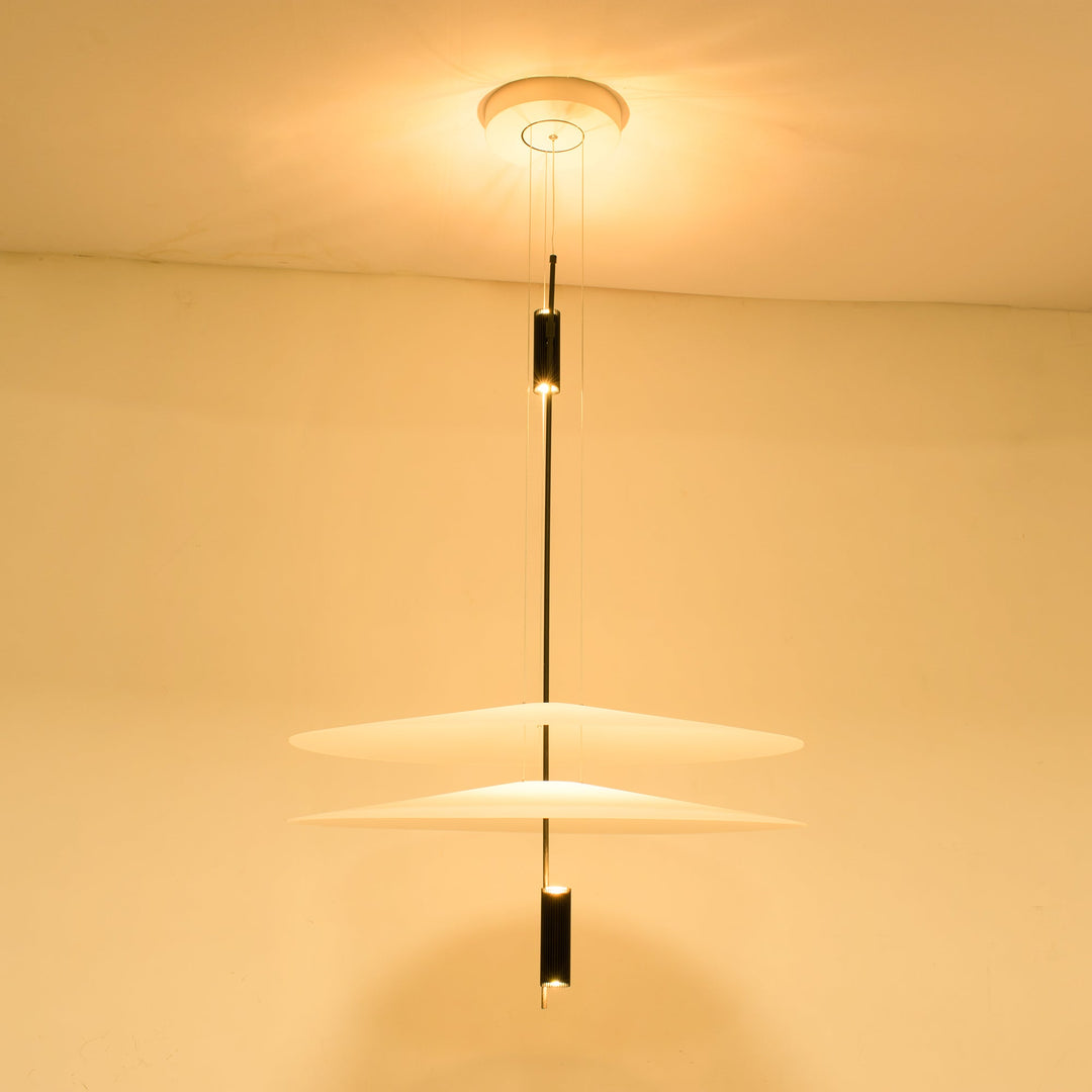 Luxurious gold Merru LED disc pendant, bringing warmth to modern interiors.