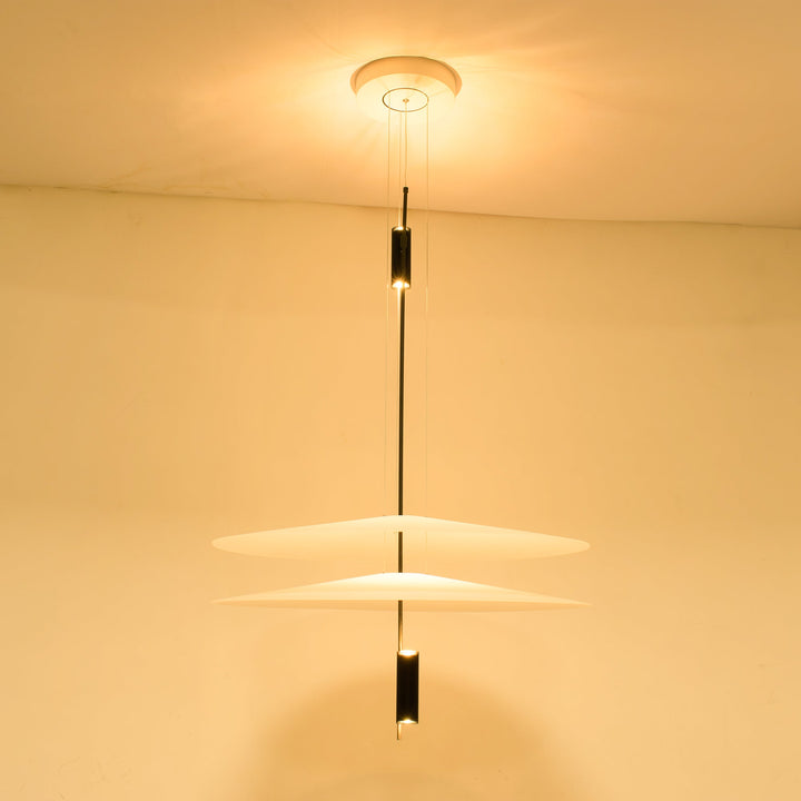 Luxurious gold Merru LED disc pendant, bringing warmth to modern interiors.