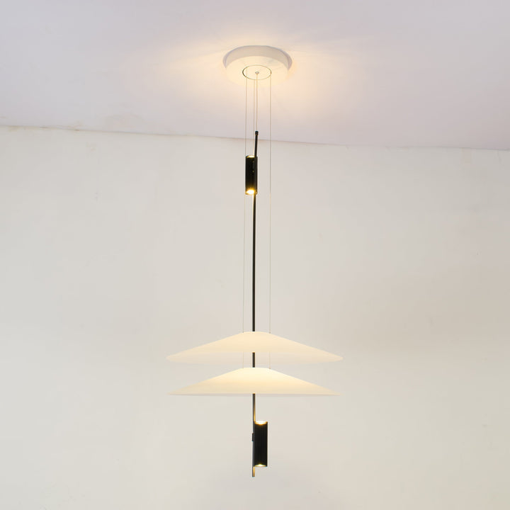 Close-up of Merru gold LED disc pendant light, showcasing intricate details.