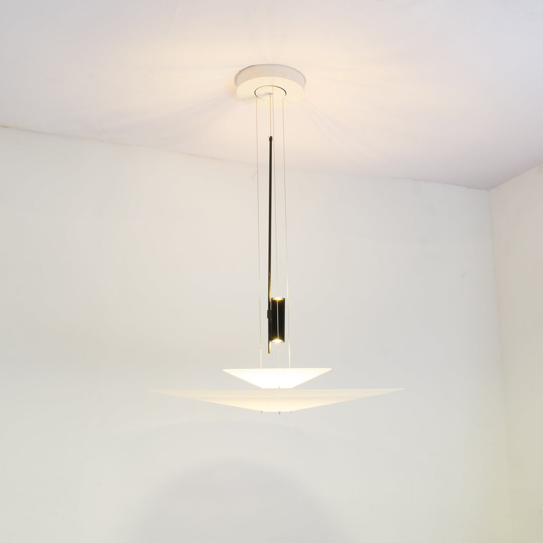 Merru modern disc LED light with warm glow, creating inviting ambient lighting.