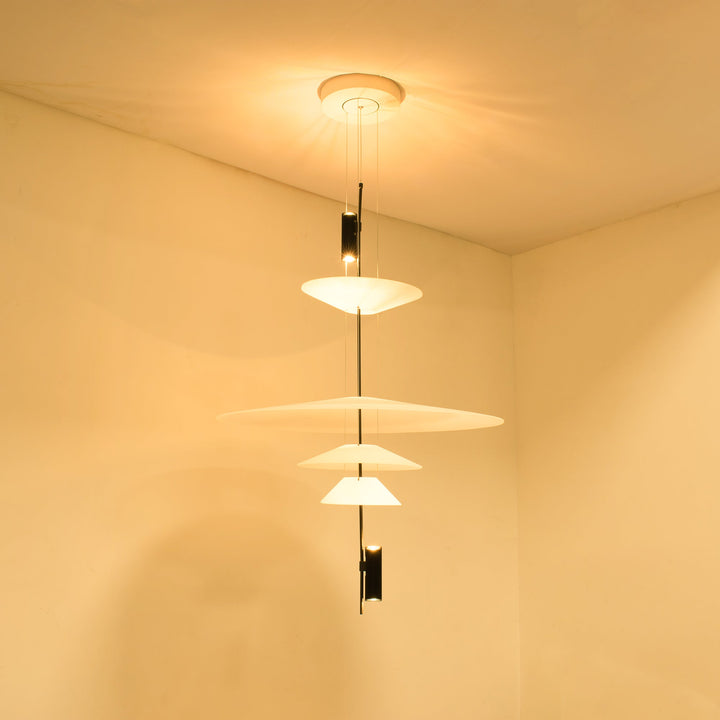 Side view of Merru black sculptural LED pendant, highlighting its slim profile.
