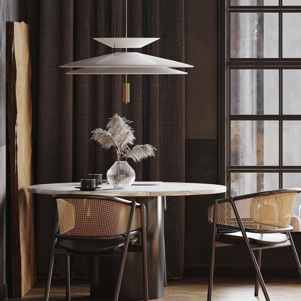 Architectural Merru black sculptural disc LED pendant light for ambient lighting.