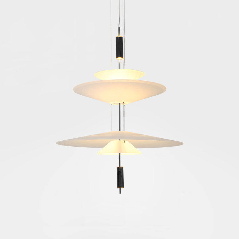 Gold Merru LED pendant light, a captivating focal point over a dining table.