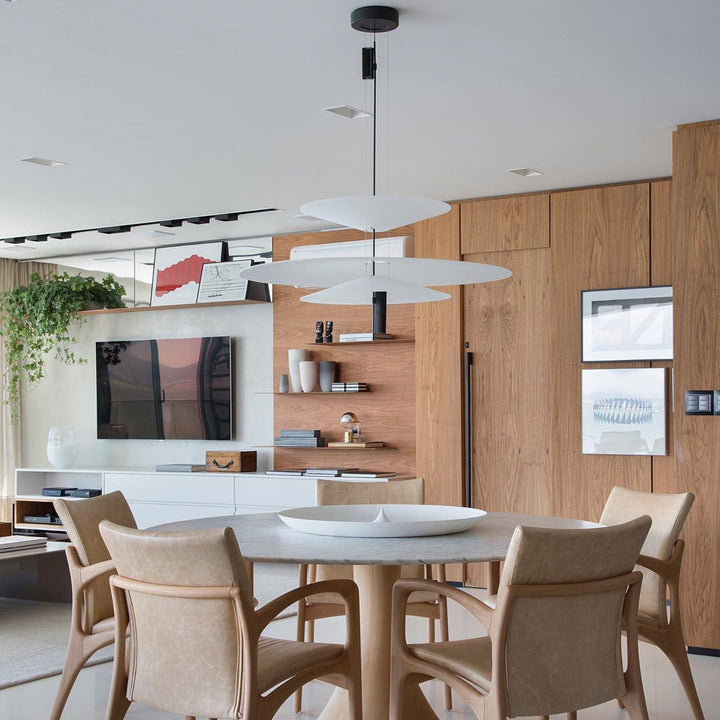 Contemporary Merru LED ceiling light with a unique sculptural disc design.