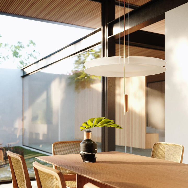 Merru sculptural modern disc LED light, providing balanced room illumination.