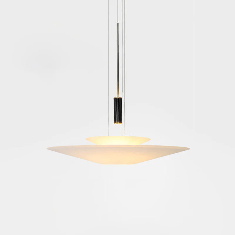 Merru gold LED disc pendant light, brightening up a modern office space.