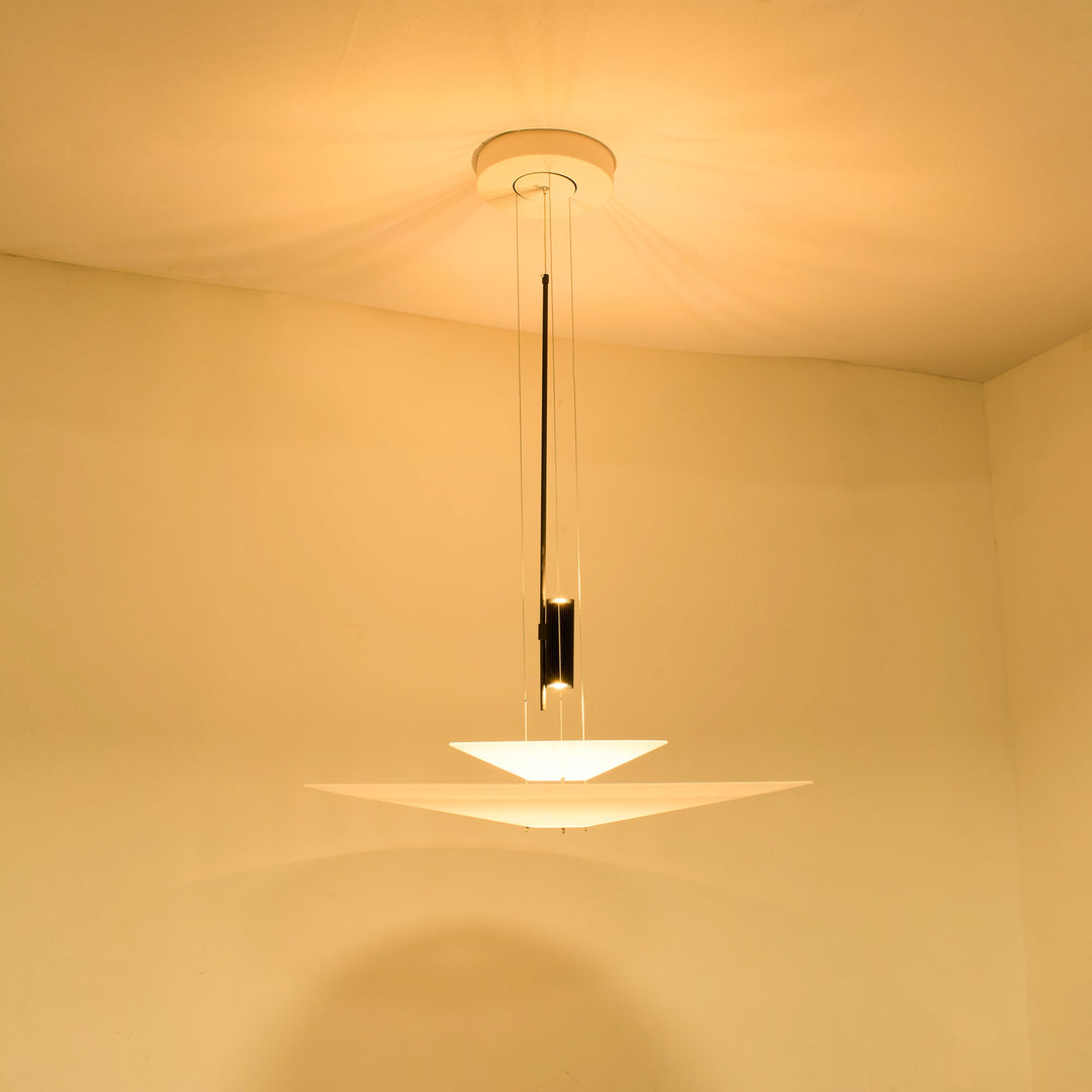 Merru sculptural disc pendant in matte black, a striking LED chandelier.