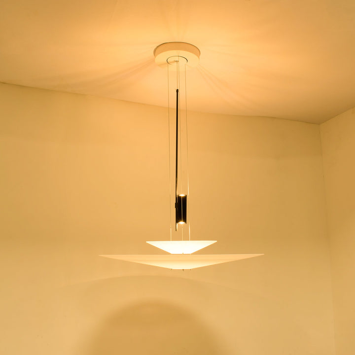 Merru sculptural disc pendant in matte black, a striking LED chandelier.