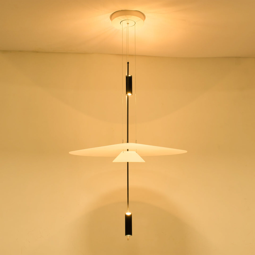 Polished gold Merru LED disc pendant light, enhancing modern home decor.