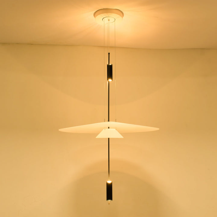 Polished gold Merru LED disc pendant light, enhancing modern home decor.