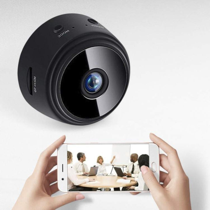 Mini HD security camera with night vision and motion detection for discreet home surveillance.