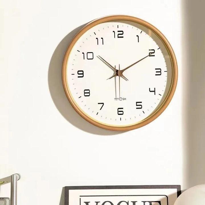 Elegant minimalist brown wooden wall clock, a contemporary home decor accessory.