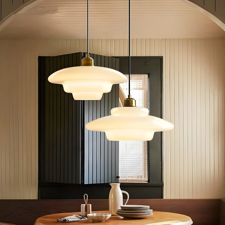 Modern hanging LED ceiling light fixture with ivory glass design.