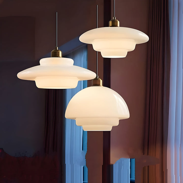 Elegant ivory glass LED pendant light, a modern home lighting fixture.
