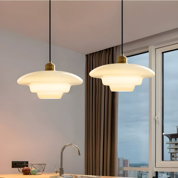 Sleek minimalist ivory glass LED hanging lamp for contemporary spaces.