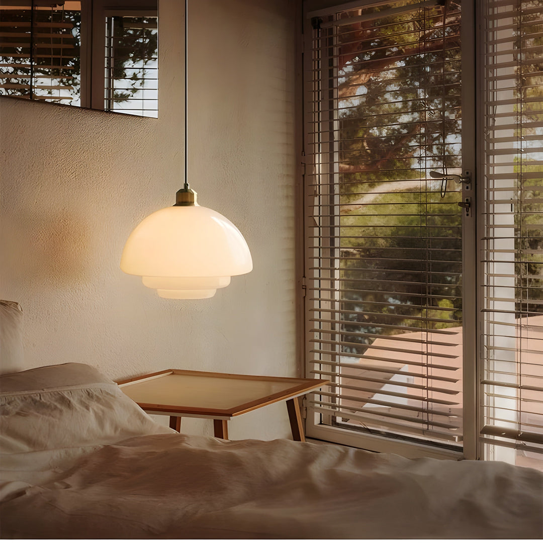 Stylish ivory glass LED pendant lamp, a modern lighting solution.