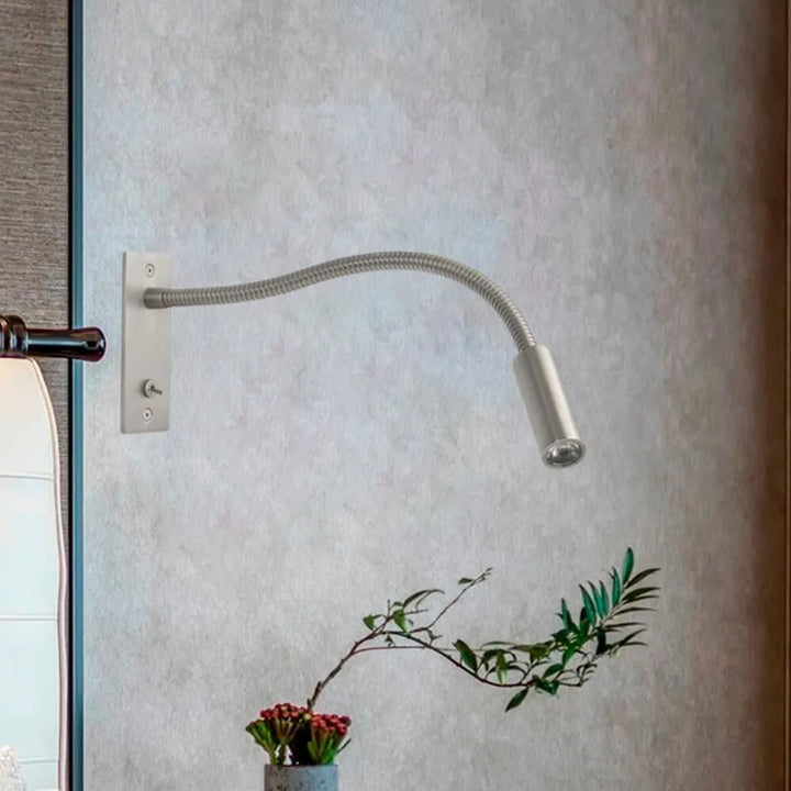 Simple LED reading wall lamp, modern minimalist style with an adjustable spotlight for efficient bedroom lighting.