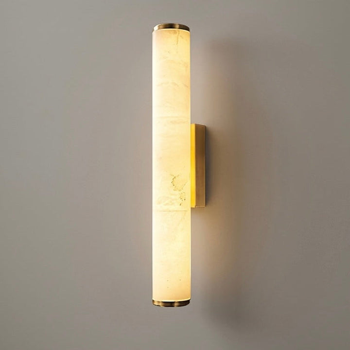 Minimalist LED wall sconce for warm white indoor lighting. Contemporary hardwired home decor lamp.