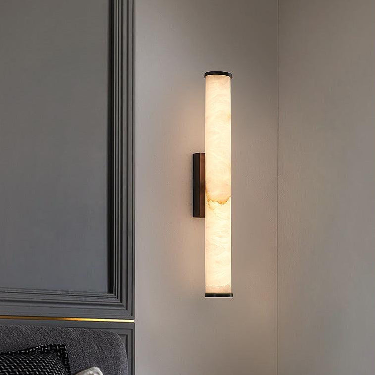 Contemporary hardwired LED wall sconce, warm white. Enhances modern indoor home lighting ambiance.