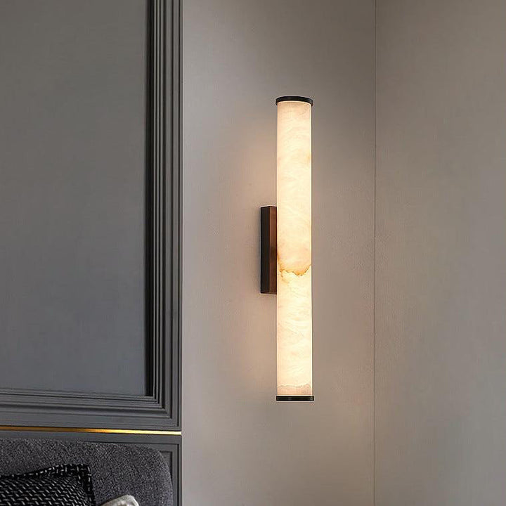Contemporary hardwired LED wall sconce, warm white. Enhances modern indoor home lighting ambiance.