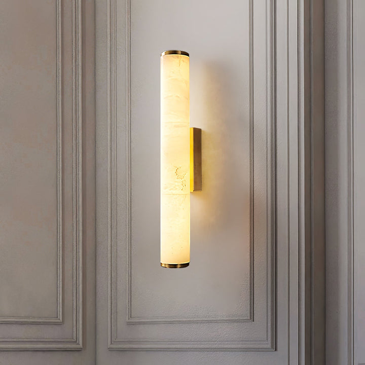 Warm white LED wall sconce, modern design for ambient indoor lighting. Hardwired lamp fixture.
