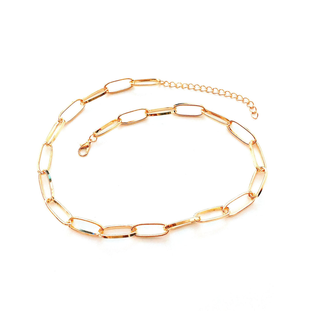 Gold plated minimalist link chain necklace & bracelet set for women, delicate and elegant design.