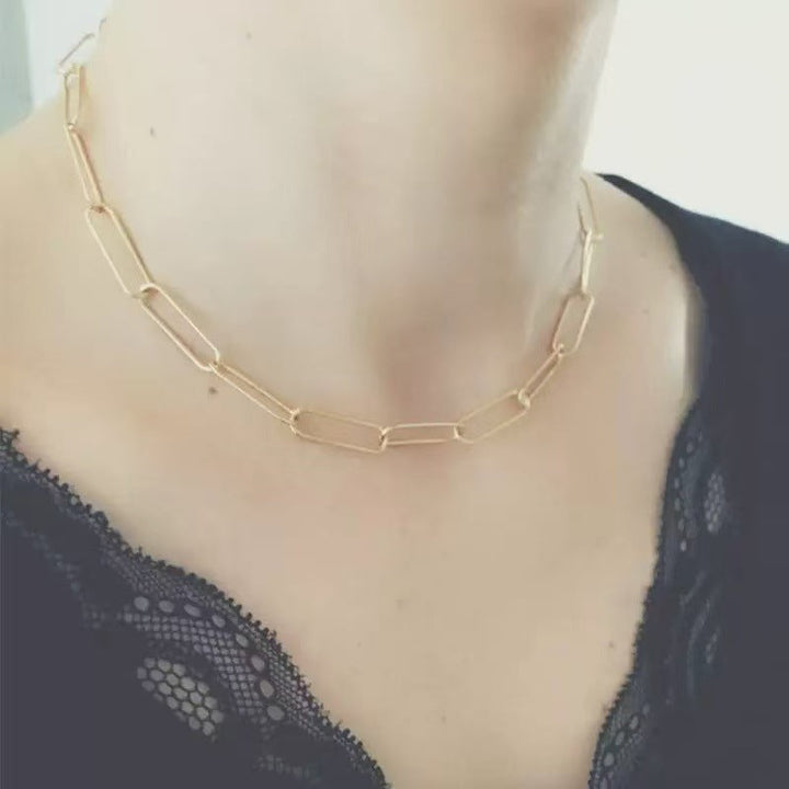 Women's delicate white finish minimalist link chain necklace, elegant and modern.