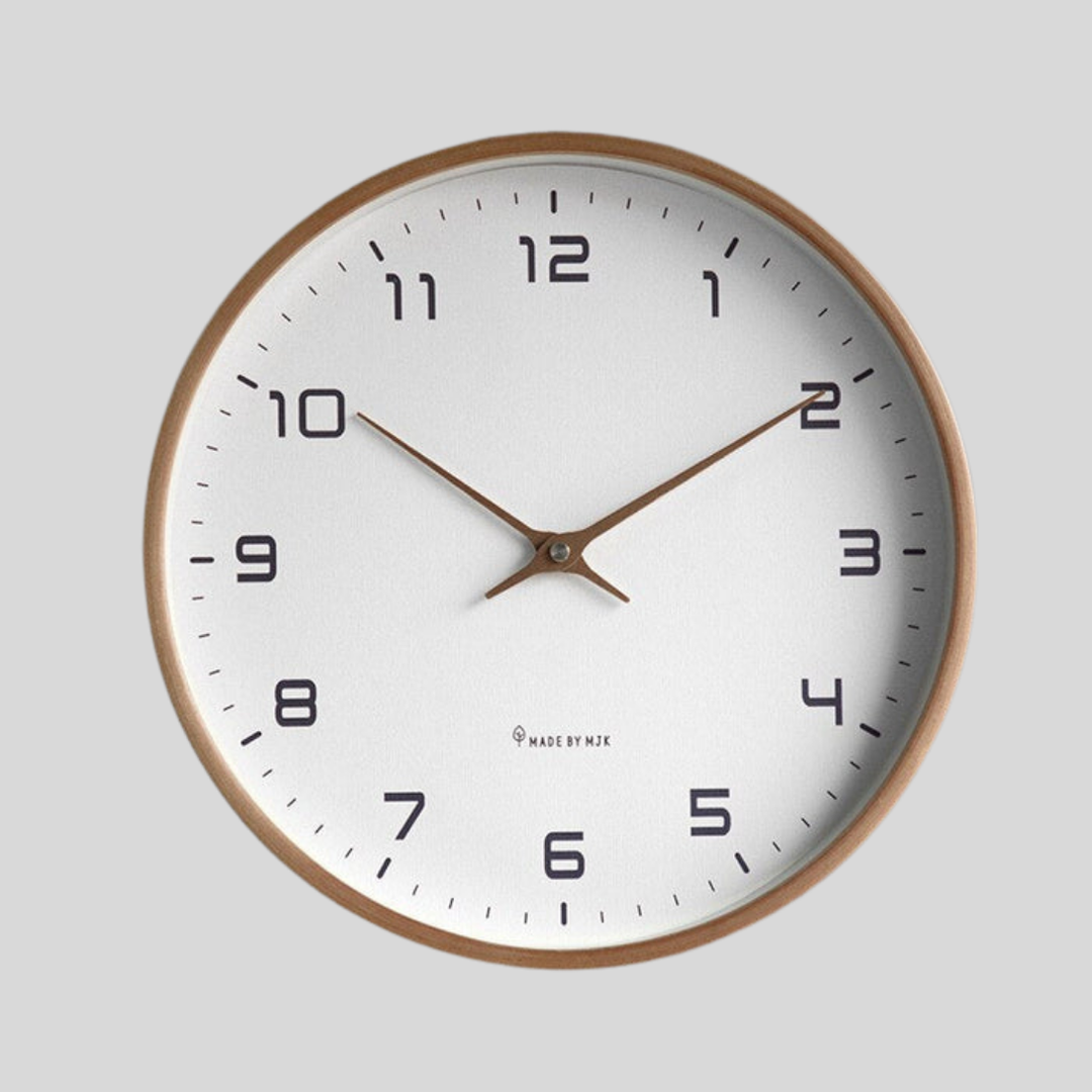 Minimalist Scandinavian round wooden wall clock for modern homes, silent movement, natural wood finish.