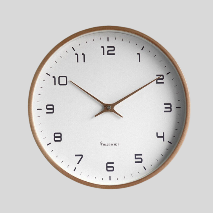 Minimalist Scandinavian round wooden wall clock for modern homes, silent movement, natural wood finish.