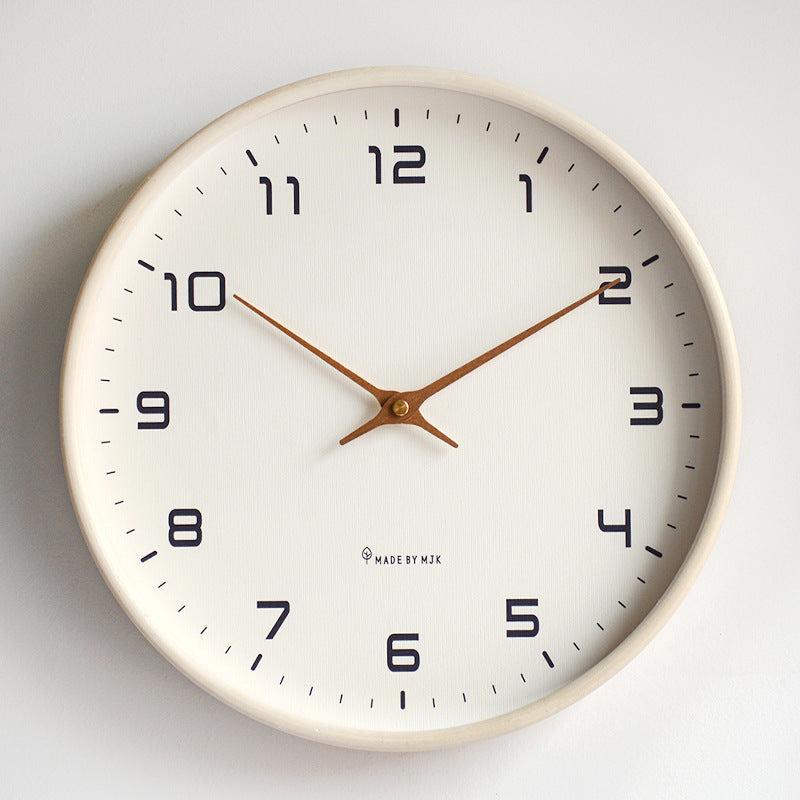 Minimalist silent wall clock with light wooden frame, perfect for modern home decor.