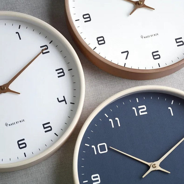 Timeless minimalist wall clock with wooden frame, a silent & elegant gift for modern home decor lovers.