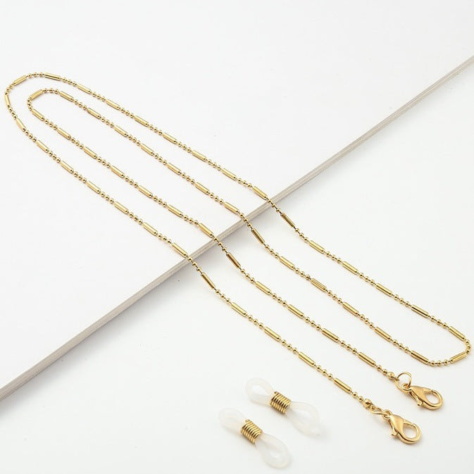 Contemporary minimalist eyewear holder, a versatile chain for sunglasses & reading glasses.