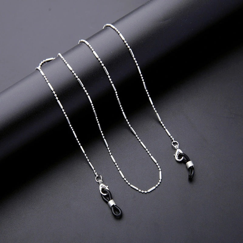 Stylish silver-tone glasses holder chain, sleek & minimalist design, perfect for men & women.