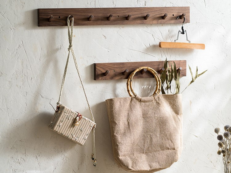 Handmade minimalist wooden coat rack, wall-mounted for entryway. Natural finish & modern Zen design for hallways.