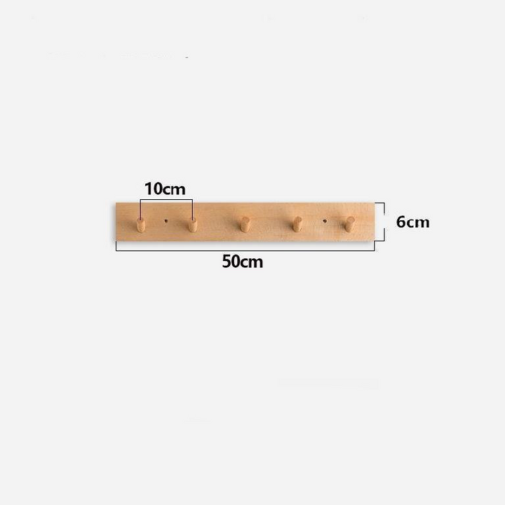 Decorative minimalist wooden coat rack with hooks. Wall-mounted Zen design in natural finish for contemporary entryways.