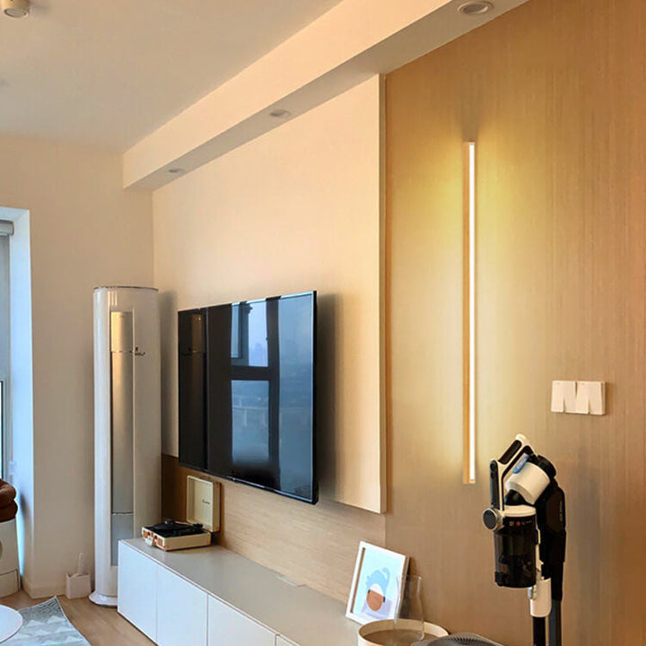 Modern wooden LED wall lamp enhancing minimalist decor in any space.