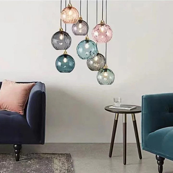 Modern adjustable 3-light pendant, elegant cascade design for homes.