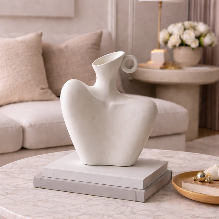 Sculptural ceramic flower vase, unique abstract design for modern home decor. Perfect artistic decorative piece.