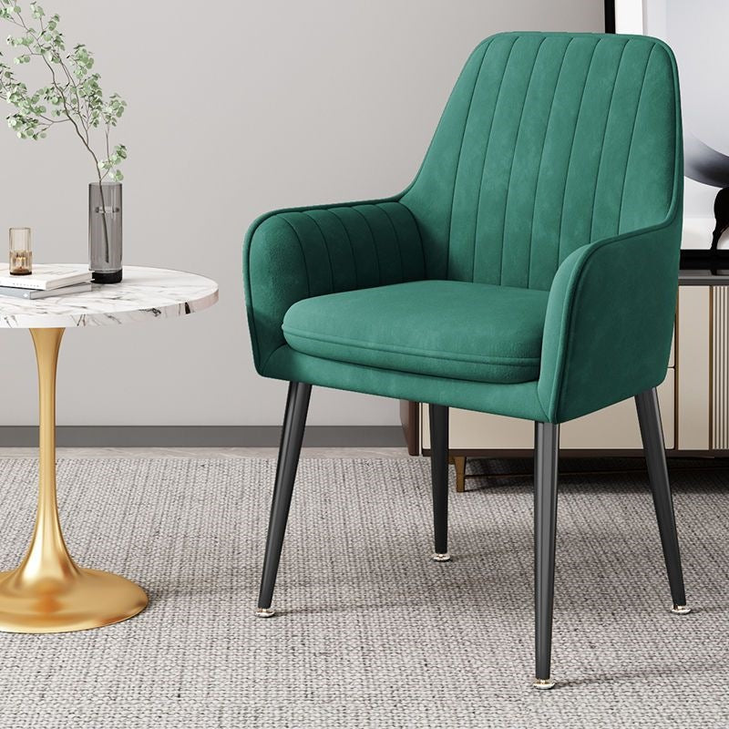 Sophisticated accent chair, velvet finish, golden legs, premium home decor.