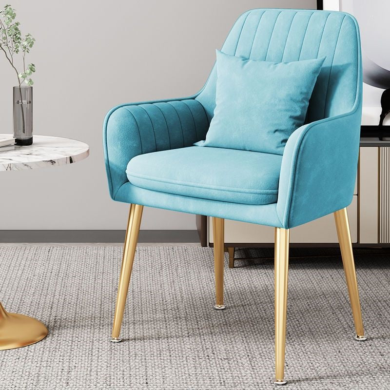Black accent chair, minimalist design, gold legs, perfect for executive office.