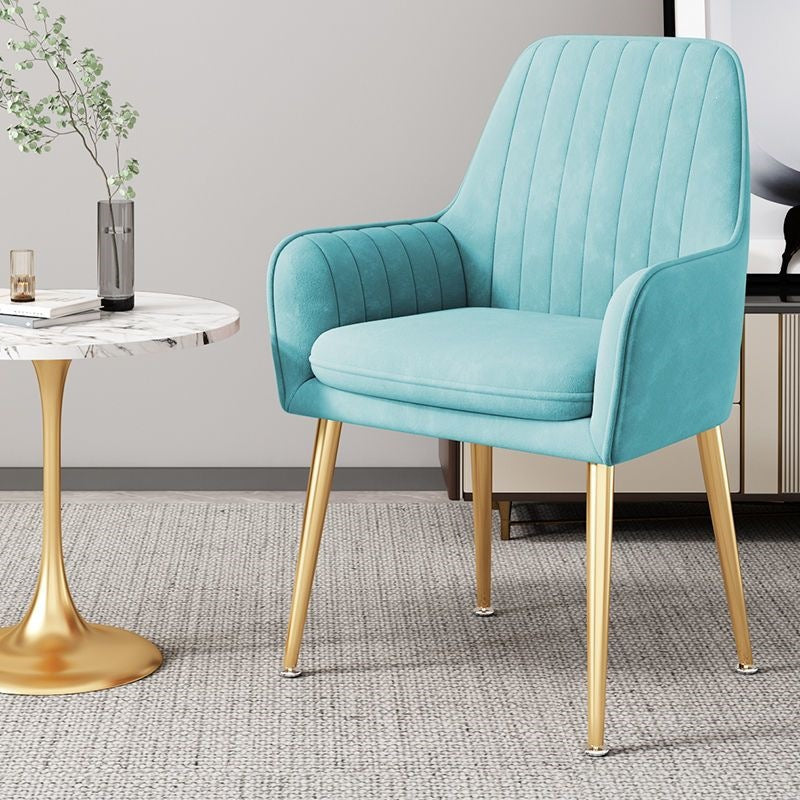 Ergonomic accent chair, gold legs, supportive for long periods of sitting.
