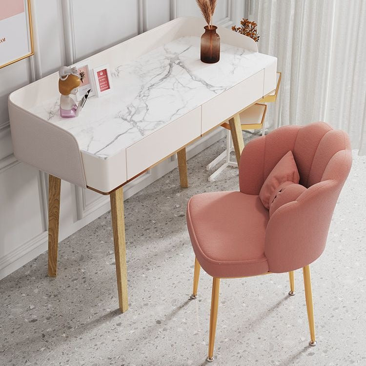 Compact velvet accent chair, sleek gold legs, perfect for small spaces.
