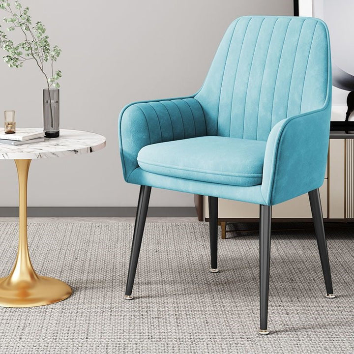 Comfortable golden leg chair, soft upholstery, ideal for meditation space.