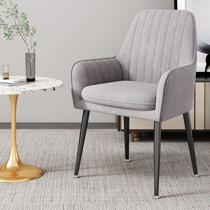 Home and office accent chair, gold legs, combining function and flair.