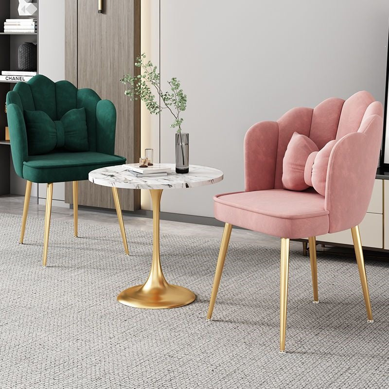 Elegant contemporary chair with polished gold legs, versatile for home & office.