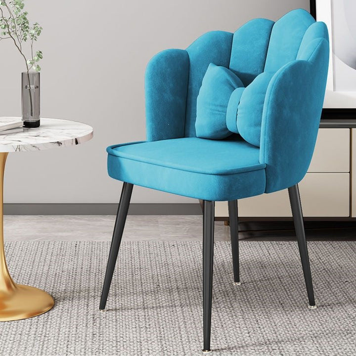 Chic modern accent chair, golden tapered legs, ideal for bedroom or lounge.