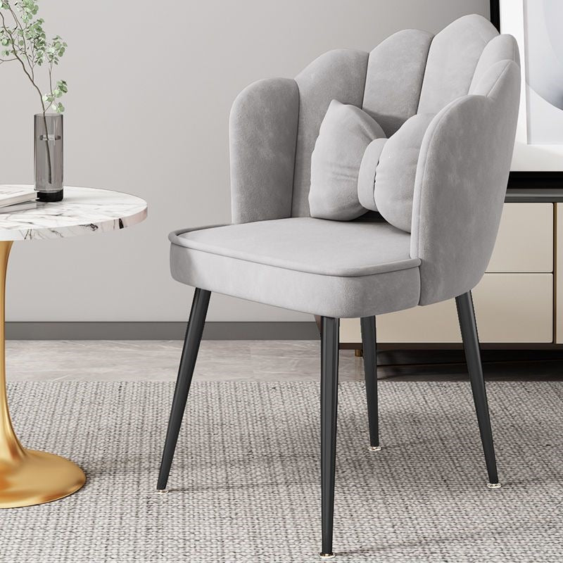 Stylish office seating, ergonomic design, gold legs, modern furniture piece.