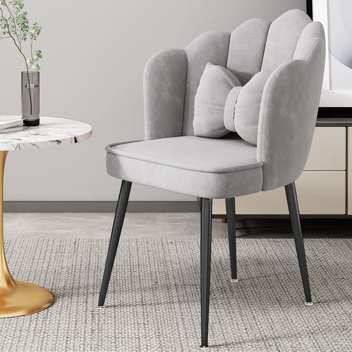 Stylish office seating, ergonomic design, gold legs, modern furniture piece.
