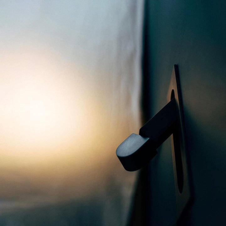 Stylish LED wall light for bedrooms, adjustable & contemporary, perfect for focused tasks.